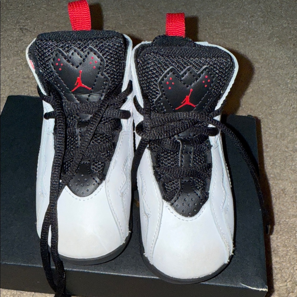 Jordan Black and White Sneakers with Red Highlights